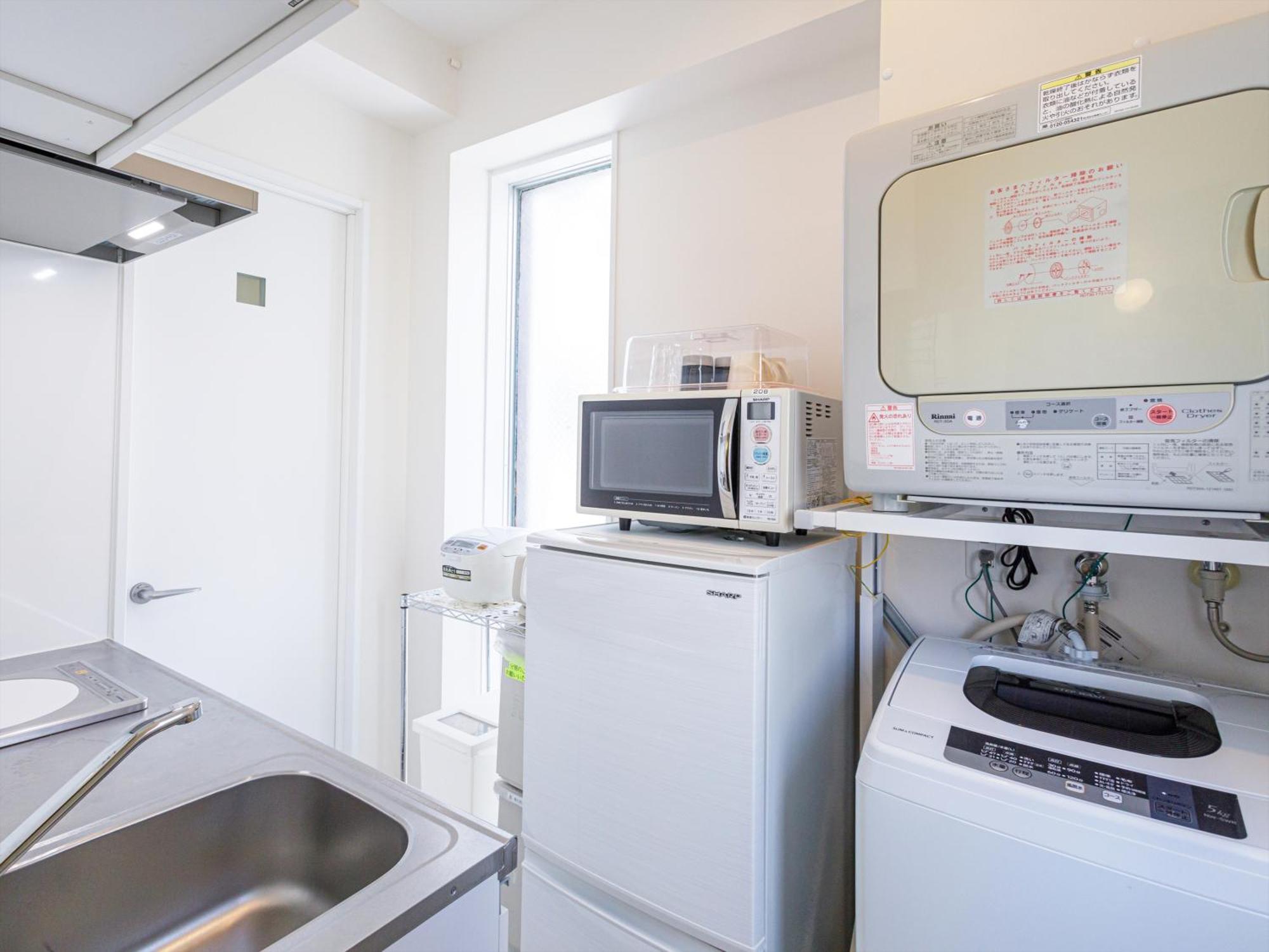 かりゆしコンドミニアムリゾート那覇スカイリビングホテル旭橋駅前 Naha Zimmer foto